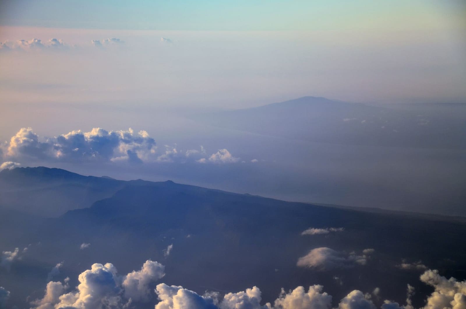 Trade-wind clouds over the channel between Maui, Molokai and Lanai seen from the air
