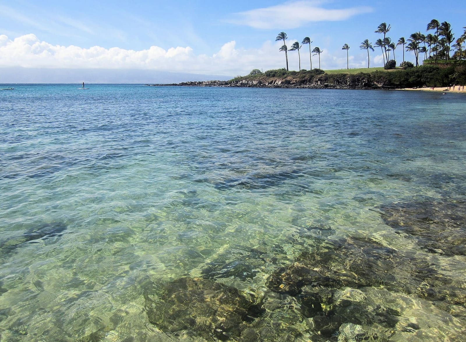 Kapalua Bay at the far end of West Maui: add 10–15 minutes to the Lahaina drive