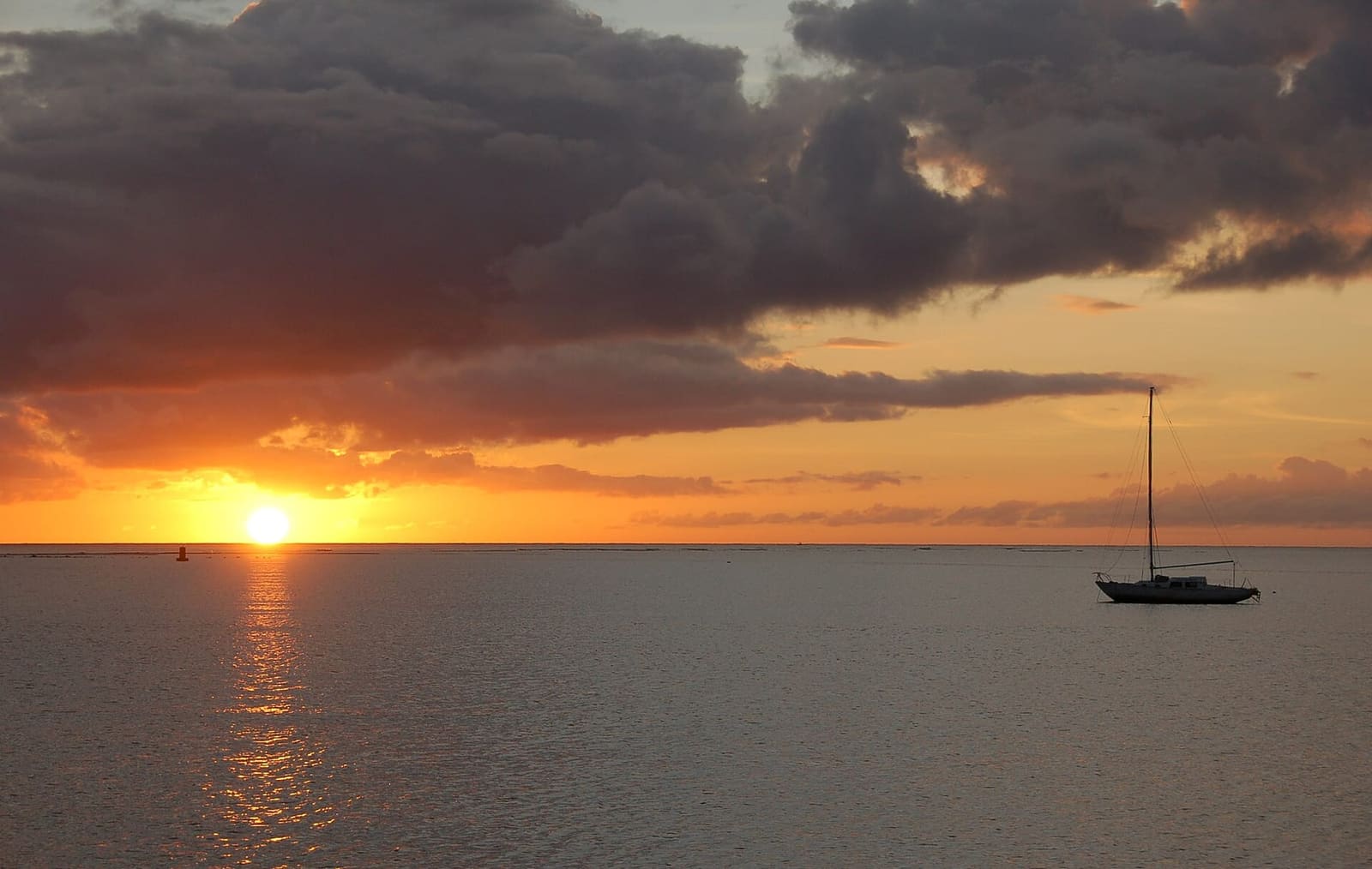 Sunset over the water off Molokai, seen from the harbor